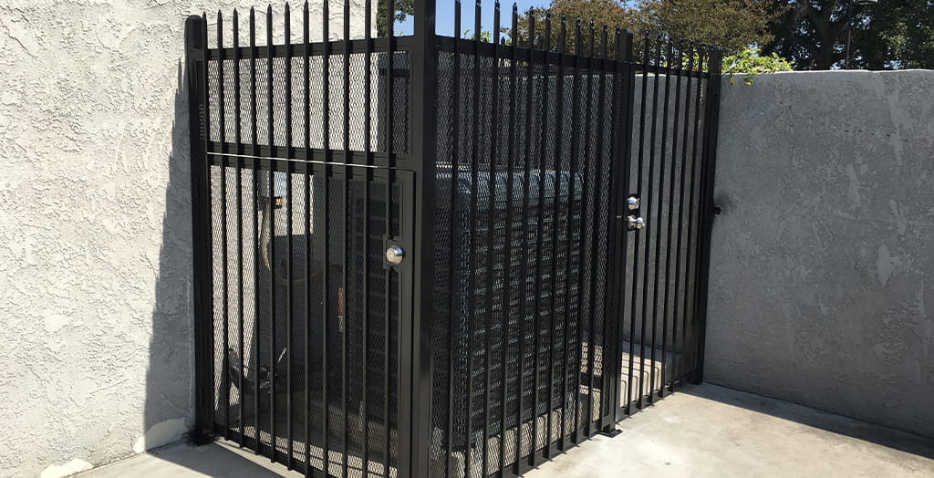Commercial steel security gate fabricated for controlled access and durability