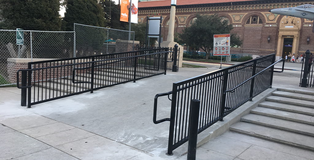 Commercial metal railing and guardrail fabrication for public walkway and stairs
